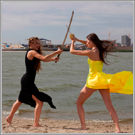 Swordfight on the beach – Danni vs Fiona